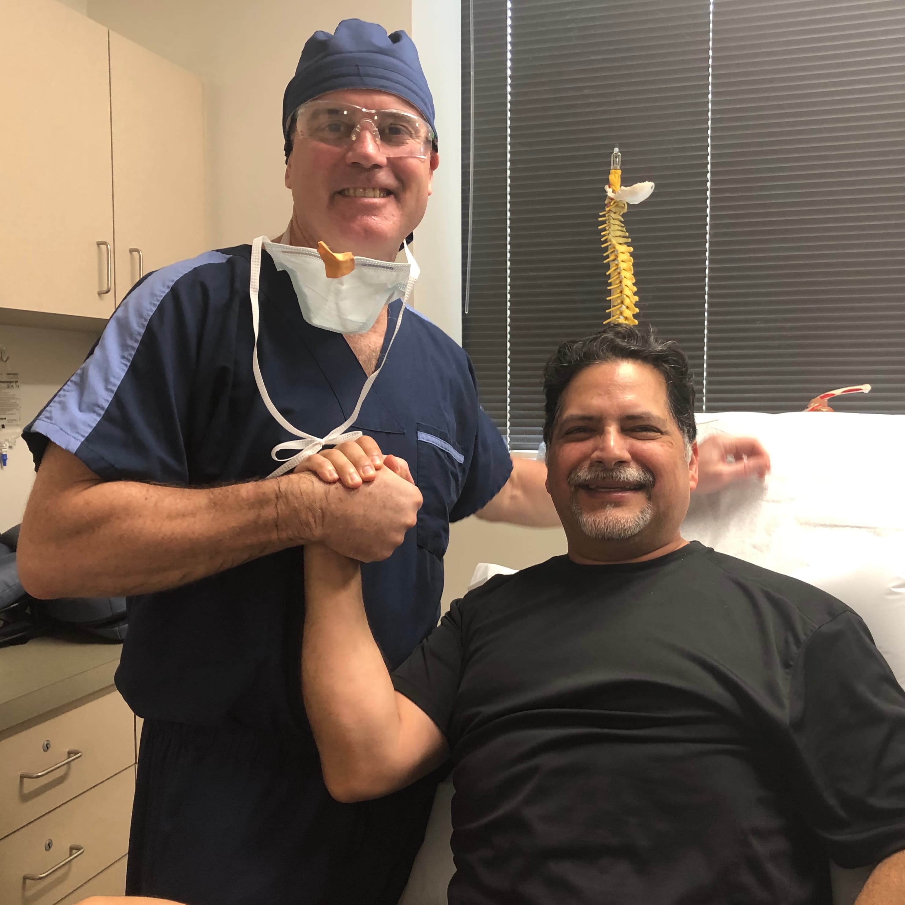 Dr. Mulvaney with a patient after a procedure