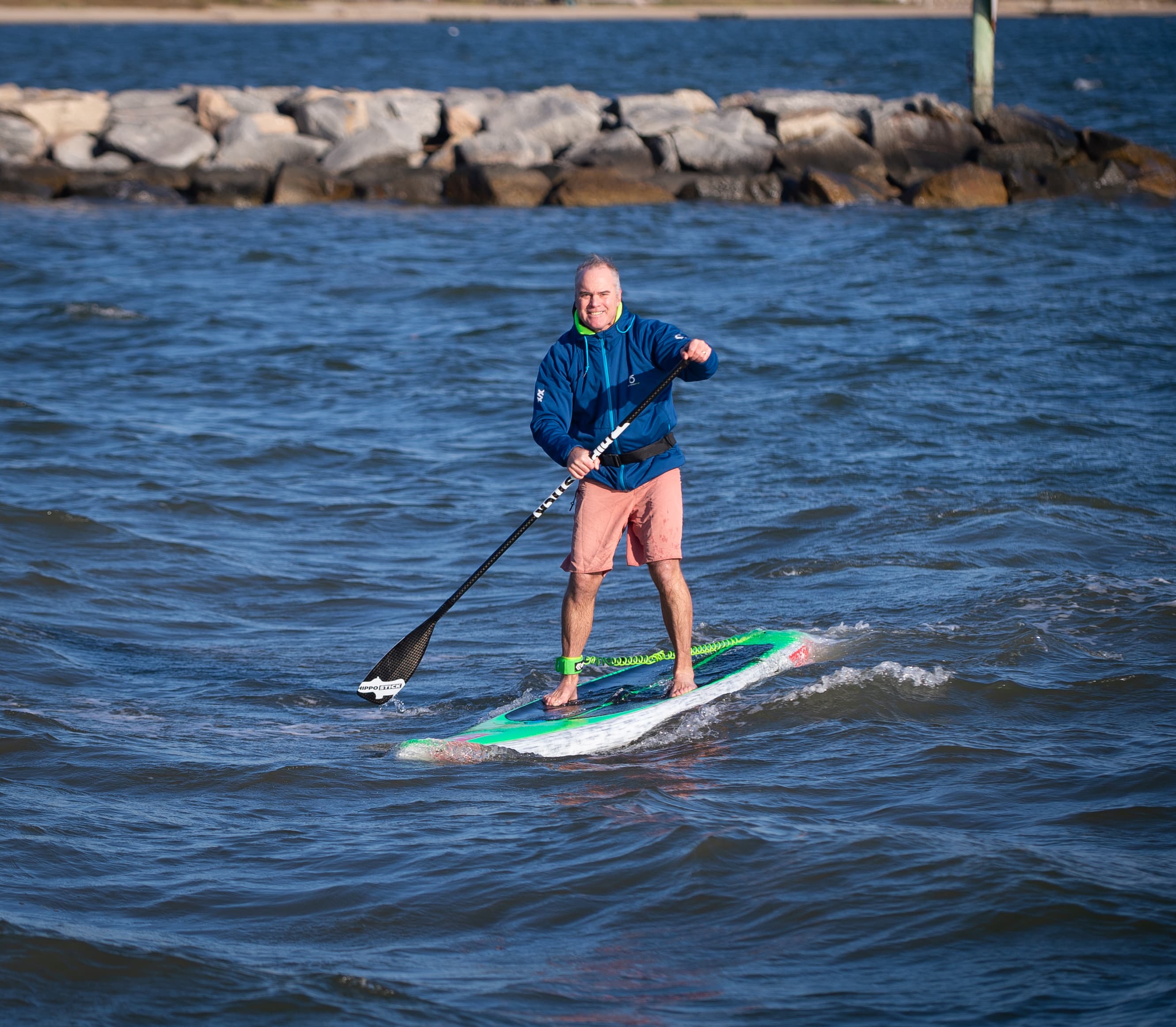 Dr. Mulvaney paddleboarding on the Chesapeake Bay