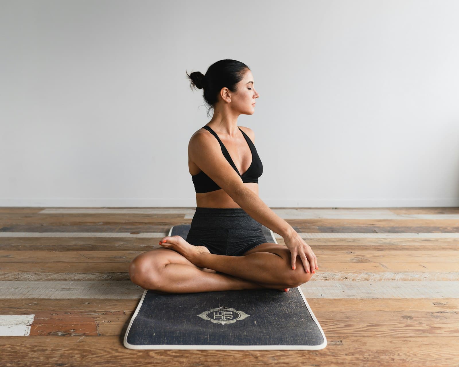 Woman in a seated yoga meditation pose
